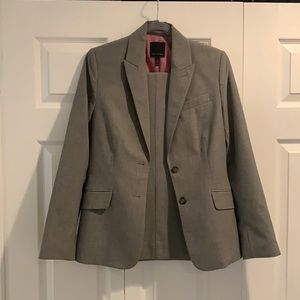 The limited grey suit size 6